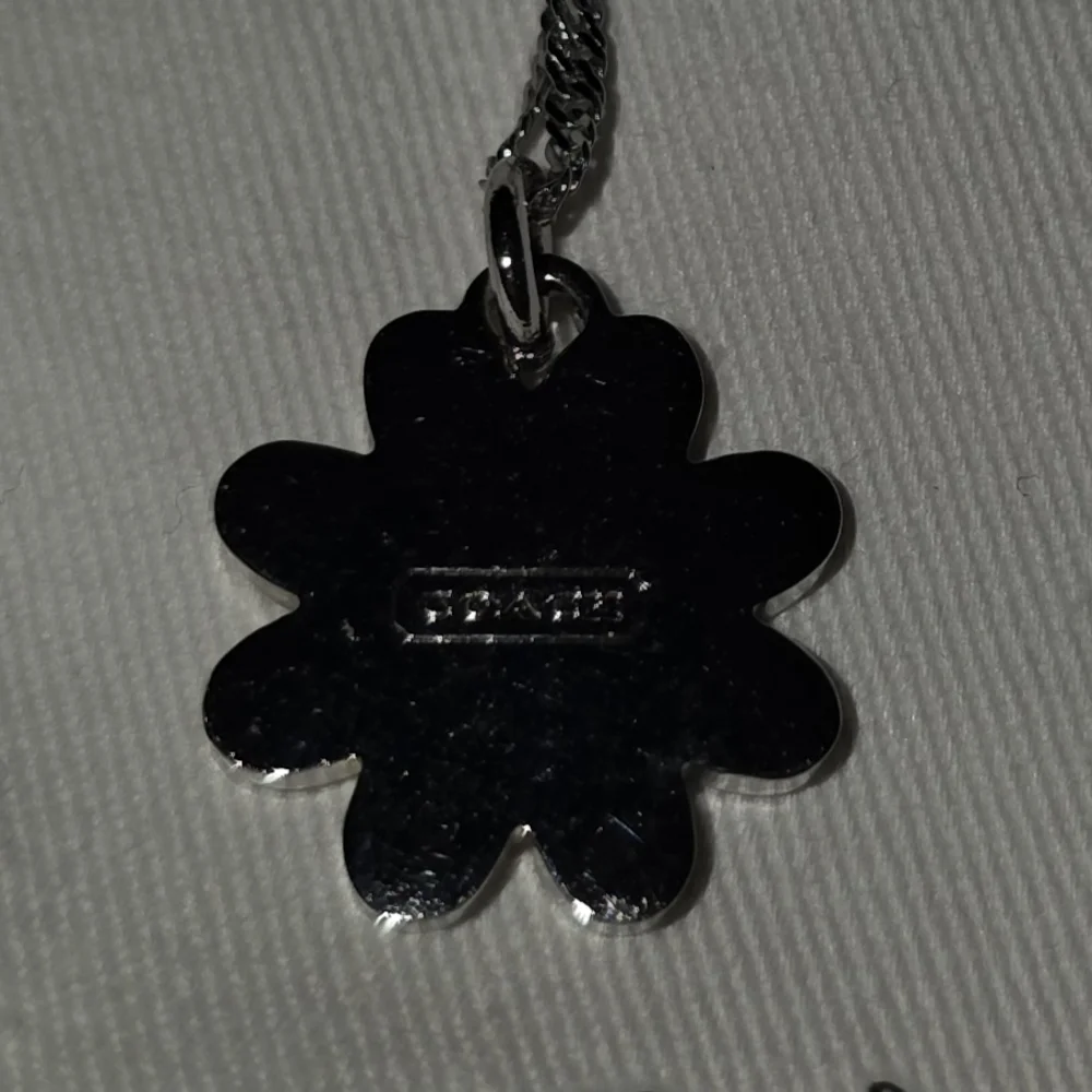 COACH Silver And Orange Daisy Pendant Necklace - Picture 4 of 6